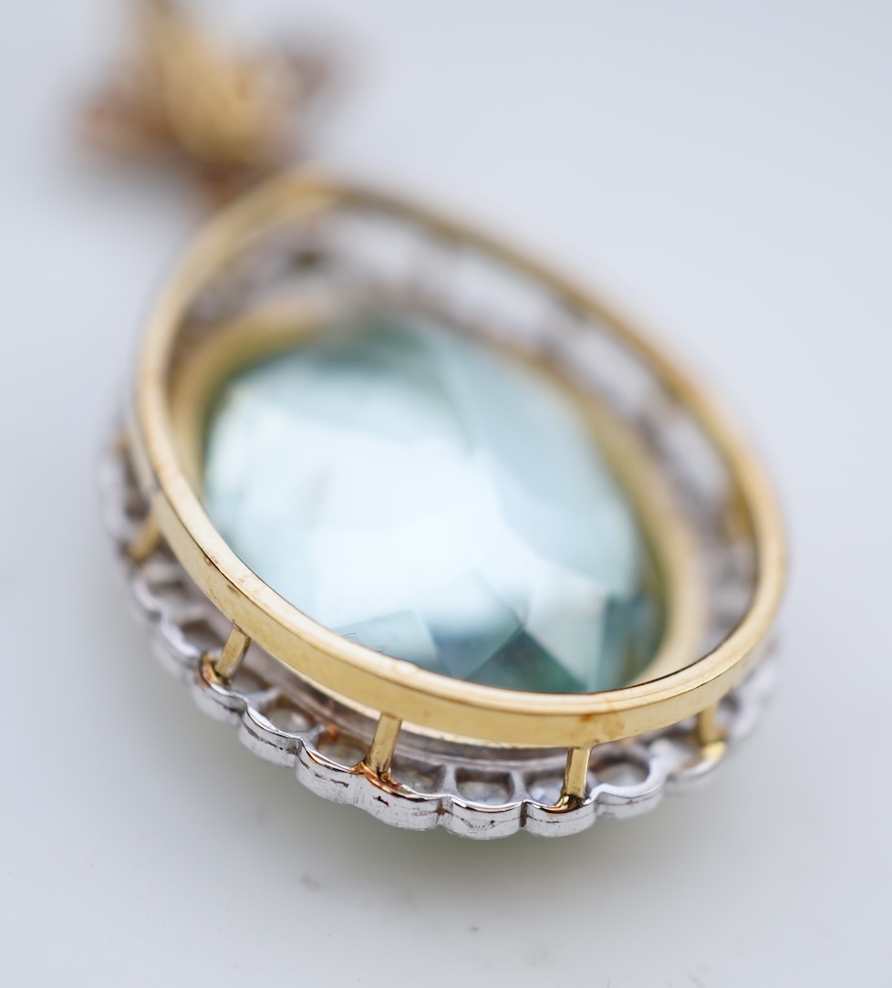 An aquamarine and diamond pendant